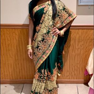 Emerald green sari with gold embroidery